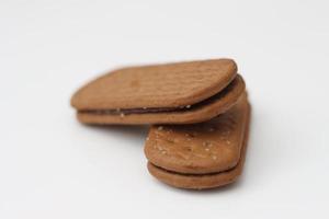 a close up of chocolate biscuit isolated on white background. photo