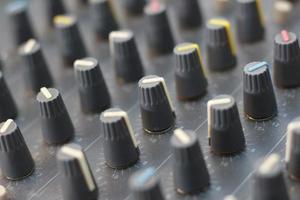 black mixer amplifier detail photo. audio equipment concept photo. selected focus. photo