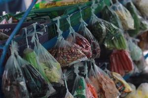 a mobile vegetable seller with a cart photo