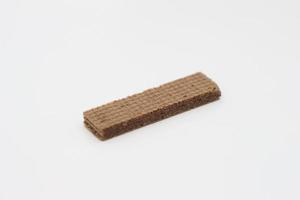 a close up of chocolate wafers isolated on white background. photo