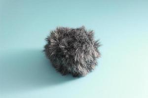 a close up of a cat fur shaped microphone silencer photo