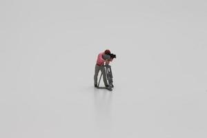 a close up of miniature figure of a videographer photo