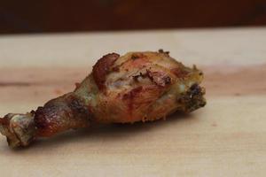 a close up of fried chicken thighs photo