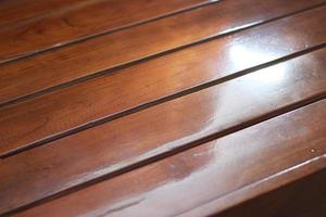 a close up of decorative detail on a wooden chair photo