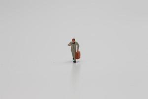 a close up of a miniature figure of an office worker photo