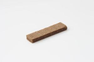 a close up of chocolate wafers isolated on white background. photo