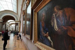 PARIS, FRANCE - OCTOBER 7 2018  - Louvre museum crowded of tourist on first sunday of month photo