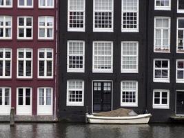 amsterdam old houses view from canals photo