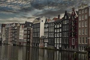amsterdam old houses view from canals photo