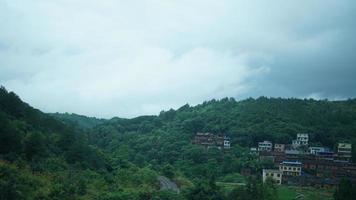 The beautiful countryside view from the runny train on the south of the China photo
