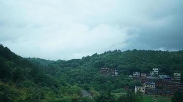 The beautiful countryside view from the runny train on the south of the China photo