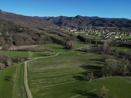 farmed fields of Borghetto di Borbera Piedmont Italy Village aerial View Panorama landscape photo