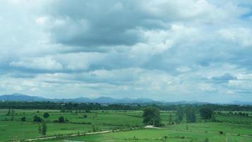 The beautiful countryside view from the runny train on the south of the China photo