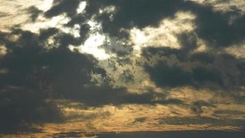 The beautiful sunset sky view with the colorful clouds and warm lights in the sky photo