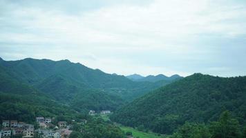 The beautiful countryside view from the runny train on the south of the China photo