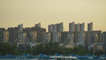 The city view with the sunset warm sunlight on the buildings in China photo