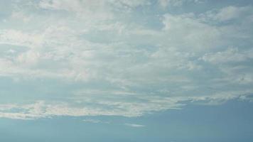 The summer sky view with the white clouds and blue sky as background photo