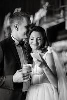 bride and groom inside a cocktail bar photo