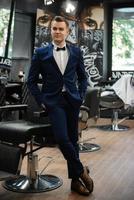 groom in the barber shop photo