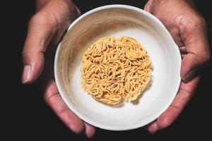 Instant noodles in a cup. food crisis concept food shortage photo