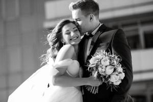 bride and groom first meeting on the roof of skyscraper photo