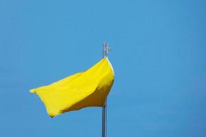 Coloured flags indicating danger and safety photo