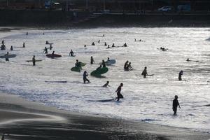 Surf school on an ocean beach photo