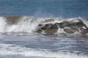 Waves in the ocean in winter time photo