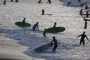 Surf school on an ocean beach photo