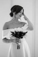 brunette bride in a tight wedding dress in a bright studio photo