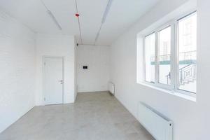 Empty room without repair. interior of white loft room office with panoramic windows in equirectangular projection photo