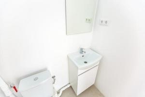 small toilet in a small office photo