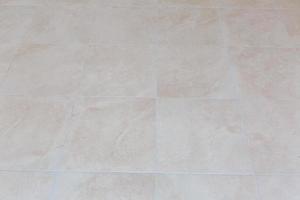 Brown ceramic floor tiles closeup texture photo