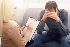 Psychologist having session with her patient in her private consulting room photo