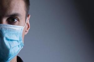 man in a protective mask, the H1N1 Virus photo