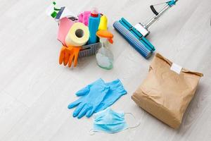 Cleaning and Disinfection at town complex amid the coronavirus epidemic. Professional teams for disinfection efforts. Infection prevention and control of epidemic. Protective gloves and mask photo