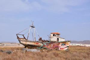 Abandoned rusty ship photo