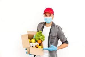 food delivery man in protective mask photo