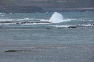 Waves in the ocean in winter time photo