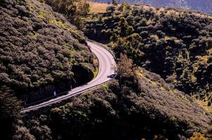 Road through the scenic landscape photo