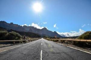 Road through the scenic landscape photo