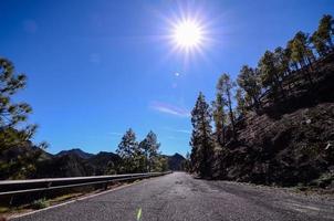 Road through the scenic landscape photo