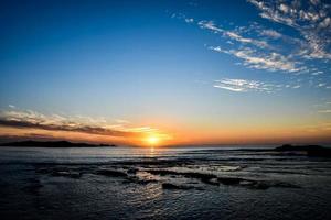 Sunset over the sea photo