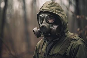 Man with a gas mask, nuclear war and environmental disaster, radioactivity catastrophe, military equipment photo