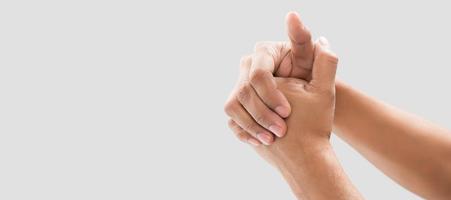 A man cracking their knuckles photo