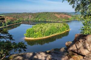 Lake and island with trees. Water reservoir Sec, Czech Republic, Europe photo