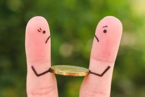 Fingers art of family during quarrel. Concept of man and woman cannot divide money after divorce. photo