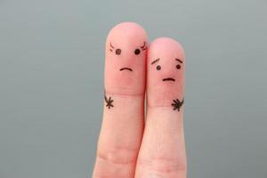 Fingers art of couple. Concept woman taller than man. photo