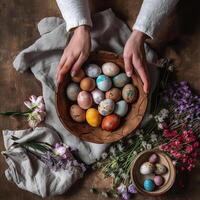 A beautiful Easter background with colorful eggs ready to be served at the festive table. photo