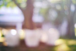 Blurred White Chairs in the Park. photo